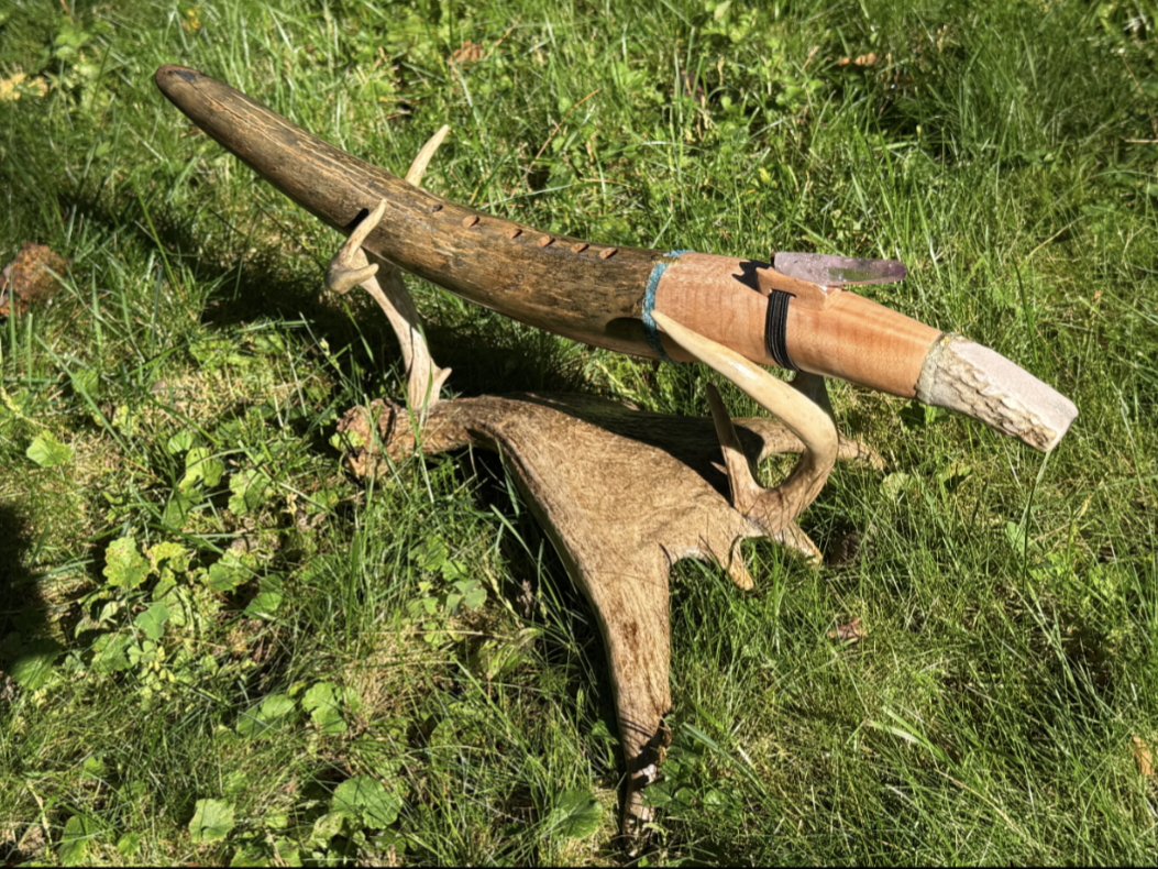 Antler flute — alternate angle showing finger holes